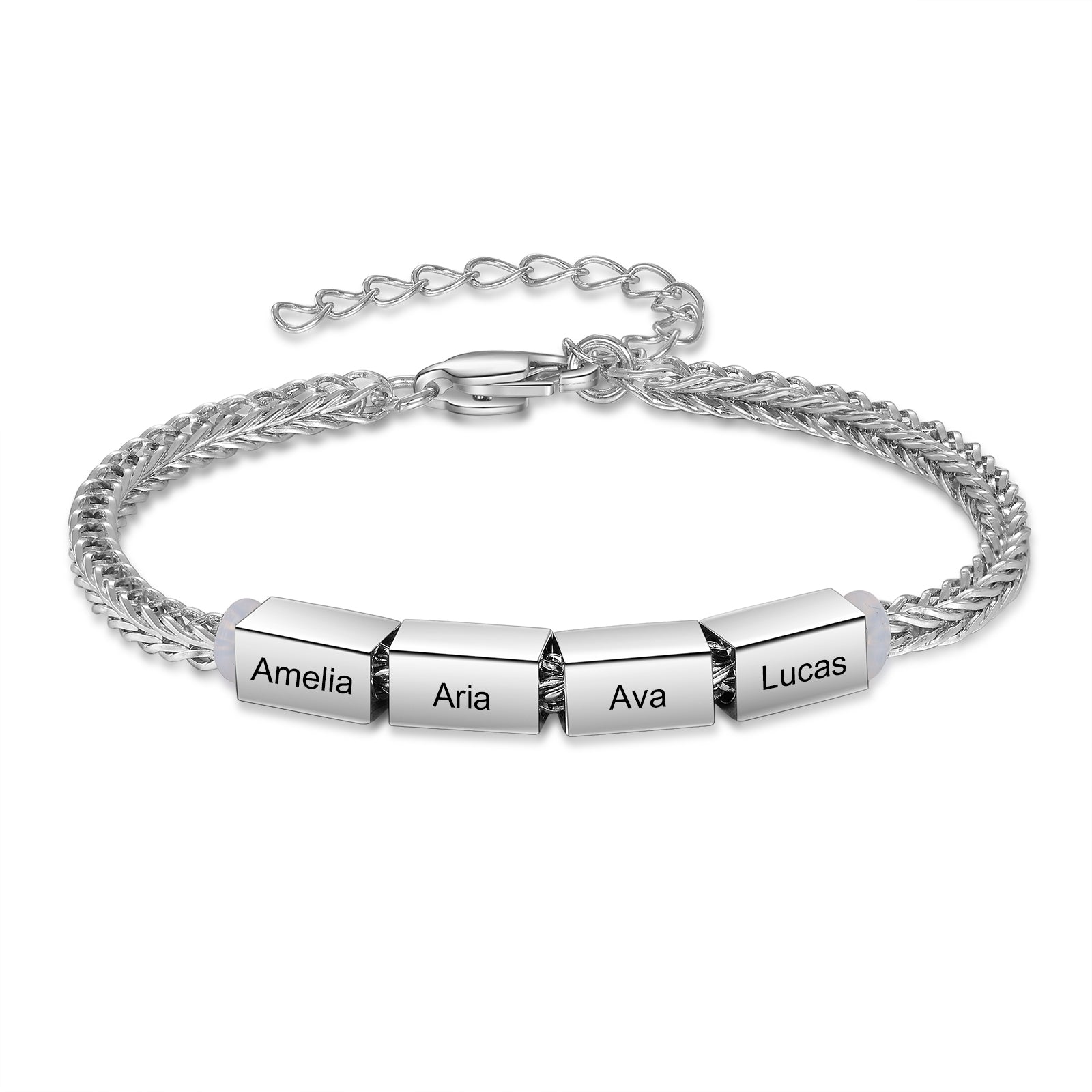 Silver family name bracelet with four engraved charms reading Amelia, Aria, Ava, and Lucas